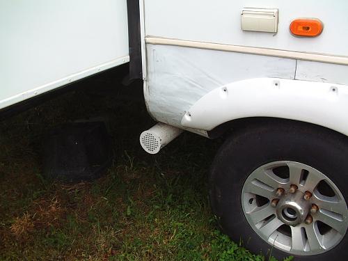 Click image for larger version

Name:	D  Dump hose tube end with vent on passenger side.JPG
Views:	43
Size:	268.6 KB
ID:	265