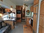 Kitchen and living area before remodeling.